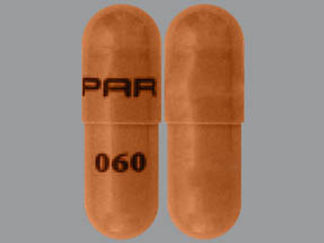 This is a Capsule imprinted with PAR on the front, 060 on the back.