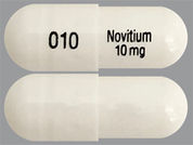 Nitisinone: Esto es un Cápsula imprimido con 010 en la parte delantera, Novitium  10 mg en la parte posterior, y es fabricado por None.