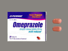 This is a beige pink oblong Tablet Dr imprinted with 20 on the front, nothing on the back, and is manufactured by PADAGIS.