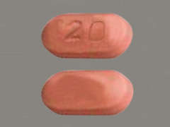 This is a beige pink oblong Tablet Dr imprinted with 20 on the front, nothing on the back, and is manufactured by PADAGIS.