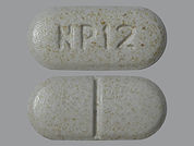 Quillichew Er: This is a Tablet Chew Ir And Er Biphasic R 24hr imprinted with NP 12 on the front, nothing on the back.