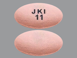 Esto es un Tableta Er 24 Hr imprimido con JKI  11 en la parte delantera, nada en la parte posterior, y es fabricado por None.