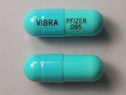 Vibramycin: Esto es un Cápsula imprimido con VIBRA en la parte delantera, PFIZER  095 en la parte posterior, y es fabricado por None.