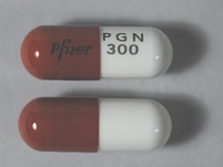Esto es un Cápsula imprimido con Pfizer en la parte delantera, PGN  300 en la parte posterior, y es fabricado por None.