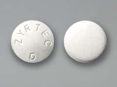 This is a white round Tablet Er 12 Hr imprinted with ZYRTEC  D on the front, nothing on the back, and is manufactured by J&J CONS/KENVUE.