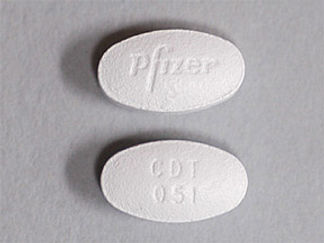 Esto es un Tableta imprimido con Pfizer en la parte delantera, CDT  051 en la parte posterior, y es fabricado por None.