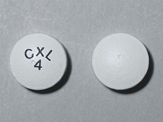 Esto es un Tableta Er 24 Hr imprimido con CXL  4 en la parte delantera, nada en la parte posterior, y es fabricado por None.
