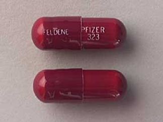 This is a Capsule imprinted with FELDENE on the front, PFIZER  323 on the back.