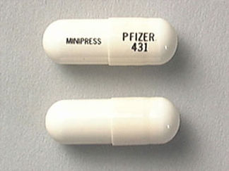 This is a Capsule imprinted with MINIPRESS on the front, PFIZER  431 on the back.