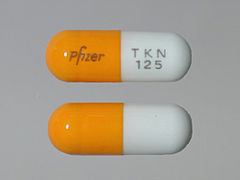 This is a Capsule imprinted with Pfizer on the front, TKN  125 on the back.