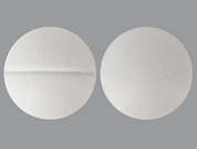 Vitamin B-6: Esto es un Tableta blanco redondo imprimido con nada en la parte delantera, nada en la parte posterior, y es fabricado por PLUS PHARMA,INC.