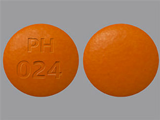 This is a Tablet Dr imprinted with PH  024 on the front, nothing on the back.