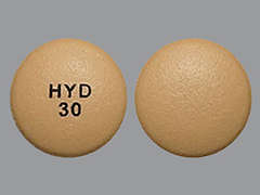 This is a yellow round Tablet Oral Only Er 24 Hr imprinted with HYD  30 on the front, nothing on the back, and is manufactured by PURDUE PHARMA L.