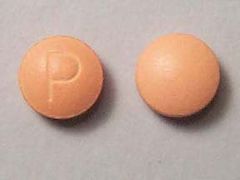 This is a orange round Tablet imprinted with P on the front, nothing on the back, and is manufactured by AVRIO/ATLANTIS.