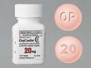 Oxycontin: This is a Tablet Oral Only Er 12 Hr imprinted with OP on the front, 20 on the back.