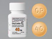 Oxycontin: This is a Tablet Oral Only Er 12 Hr imprinted with OP on the front, 40 on the back.