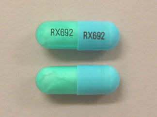 This is a Capsule imprinted with RX692 on the front, RX692 on the back.