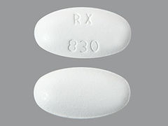 This is a white elliptical Tablet imprinted with RX  830 on the front, nothing on the back, and is manufactured by OHM-SUN PHARMAC.