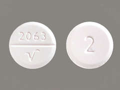 This is a Tablet imprinted with 2063  V on the front, 2 on the back.