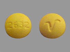This is a yellow round Tablet imprinted with 2632 on the front, logo on the back, and is manufactured by SOLCO HEALTHCAR.