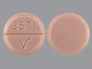 Esto es un Tableta imprimido con 3571 and logo en la parte delantera, nada en la parte posterior, y es fabricado por None.