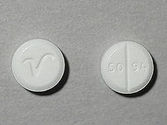 This is a Tablet imprinted with V on the front, 50 94 on the back.