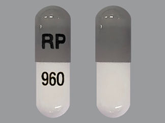 This is a Capsule Er Sprinkle Biphasic 40-60 imprinted with RP on the front, 960 on the back.