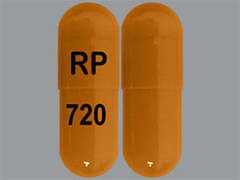 This is a orange oblong Capsule Er 24 Hr imprinted with RP on the front, 720 on the back, and is manufactured by RHODES PHARMA L.