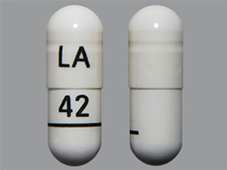 This is a Capsule imprinted with LA on the front, 42 on the back.