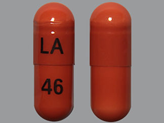 This is a Capsule imprinted with LA on the front, 46 on the back.