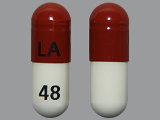 This is a Capsule imprinted with LA on the front, 48 on the back.