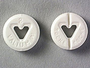 Valium: This is a Tablet imprinted with 2  VALIUM on the front, ROCHE  ROCHE on the back.