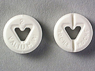 This is a Tablet imprinted with 2  VALIUM on the front, ROCHE  ROCHE on the back.