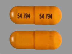 This is a orange oblong Capsule imprinted with 54 794 on the front, 54 794 on the back, and is manufactured by EXELAN PHARMACE.