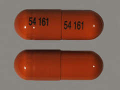 This is a light caramel oblong Capsule imprinted with 54 161 on the front, 54 161 on the back, and is manufactured by ROXANE/WEST-WAR.