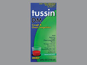 Tussin Dm: This is a Syrup imprinted with nothing on the front, nothing on the back.