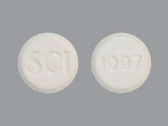 Esto es un Tableta Masticable imprimido con SCI en la parte delantera, 1007 en la parte posterior.