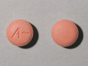 Ambien Cr: This is a Tablet Er Multiphase imprinted with A~ on the front, nothing on the back.