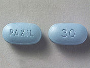 Paxil: This is a Tablet imprinted with PAXIL on the front, 30 on the back.