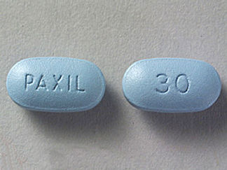 Esto es un Tableta imprimido con PAXIL en la parte delantera, 30 en la parte posterior, y es fabricado por None.