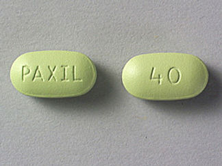 Esto es un Tableta imprimido con PAXIL en la parte delantera, 40 en la parte posterior, y es fabricado por None.