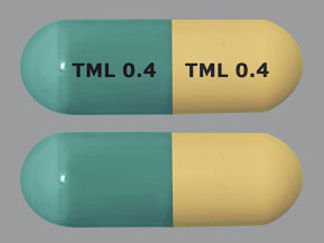 This is a Capsule imprinted with TML 0.4 on the front, TML 0.4 on the back.