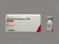 This is a white Vial imprinted with nothing on the front, nothing on the back, and is manufactured by SANDOZ.