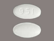 Cozaar: This is a white oval Tablet imprinted with 951 on the front, nothing on the back, and is manufactured by ORGANON LLC.