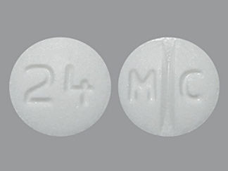 This is a Tablet imprinted with M C on the front, 24 on the back.