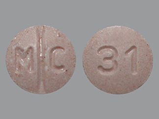 This is a Tablet imprinted with M C on the front, 31 on the back.