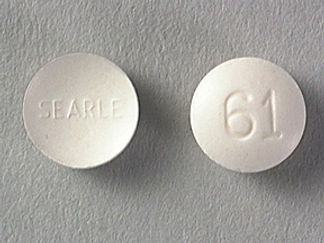 This is a Tablet imprinted with SEARLE on the front, 61 on the back.