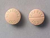 Aldactone: This is a peach round Tablet imprinted with SEARLE  103 on the front, ALDACTONE  100 on the back, and is manufactured by PHARMACIA-UPJHN.