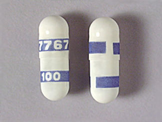 This is a Capsule imprinted with 7767 on the front, 100 on the back.