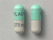 Flagyl: This is a Capsule imprinted with FLAGYL on the front, 375 mg on the back.